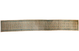 Distressed Hamadan runner showing continuous Herati pattern and faded blue borders.