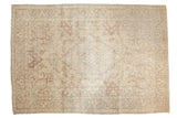 Vintage distressed Tabriz carpet, ivory field, Rococo medallion, pale raspberry, dusty blush.