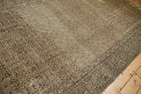 Distressed Hamadan runner with muted silver and ivory Herati pattern, showing worn texture.