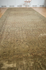 Detailed view of worn silver and blush Herati pattern on the distressed Hamadan runner.