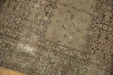 Distressed Hamadan runner showing faded Herati motif and areas of visible foundation.