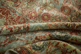 Distressed vintage Sarouk rug pile, floral bouquets, Rococo scrolls in wine red and dusty teal.