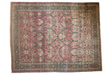 Vintage distressed Tabriz carpet, raspberry red field, navy lattice, floral palmettes. 9'7