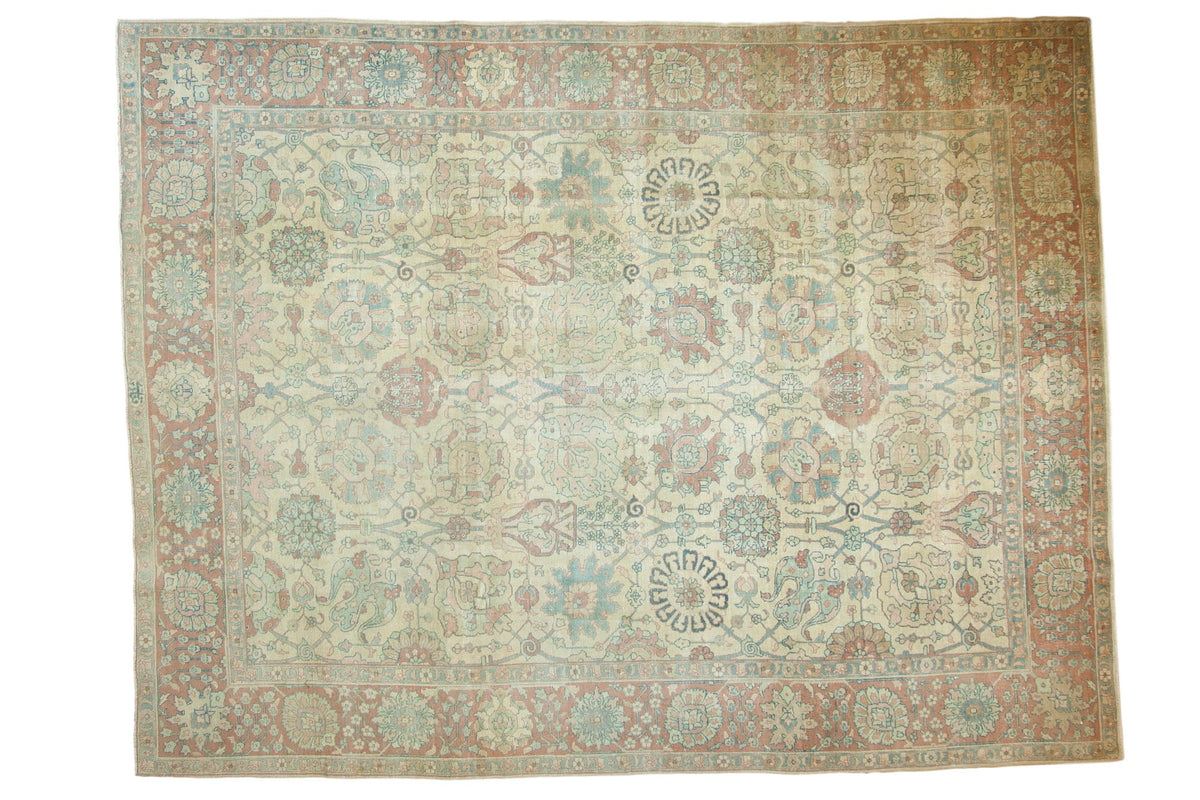 Vintage distressed Tabriz rug with a Safavid floral lattice in slate blue, dusty rose, and antique ivory.