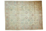 Vintage distressed Tabriz rug with a Safavid floral lattice in slate blue, dusty rose, and antique ivory.