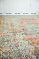 Vintage Distressed Mahal carpet showcasing even wear with faint foundation, brick and blue tones.