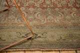 Antique Persian Bijar rug's reciprocating turtle border and distressed Herati pattern with patina.