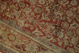 Distressed Persian Bijar rug with time-softened Herati and turtle motifs in rust and olive.