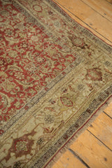 Antique distressed Bijar rug with Herati motif field, reciprocating turtle border, and abrashes.