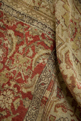 Detailed texture of the antique Persian Bijar rug, showing Herati motif and turtle border.