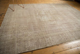 Vintage Distressed Sparta Carpet corner, revealing Rococo spandrel motif and mostly even pile wear.