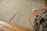 Surface texture of hand woven kilim showing natural ivory, gray, beige striations.