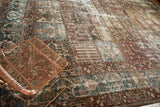Distressed Bakhtiari carpet, wear exposing foundation, paneled tree of life, burgundy, blue.