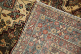 Distressed Bakhtiari runner pile with visible knot heads and hand-knotted reverse in teal, terracotta.