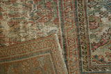 Distressed Mahal carpet with worn pile, exposed foundation, and hand knotting details.