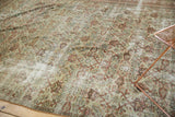 Distressed texture of the Mahal rug, showing worn ivory and muted terracotta Herati.