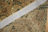 Hand-knotted foundation of vintage Turkmen runner with natural tones and a secured side.