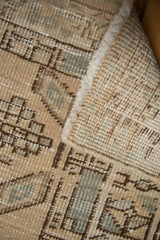 Vintage Serab rug backing, with visible foundation, intact selvage, and worn ivory, seafoam pile.