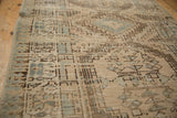 Distressed Serab rug, displaying even wear, ivory, powder blue, and oxidized silver motifs.