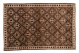 Vintage distressed Turkish Oushak rug with allover silver and pale mauve geometric serrated medallions on a chocolate brown ground, 5' x 7'7