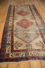 Vintage Serab runner showing intricate geometric mahi-mahi motifs, ivory field, and detailed reciprocating border.