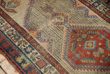 Vintage Serab runner, intricate serrated geometric mahi-mahi patterns in madder red, ivory, blue.