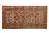 Vintage distressed Belouch rug runner, rust and slate blue diamond lattice pattern. 2'11
