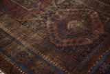 Distressed antique Belouch rug with intricate serrated geometric motifs in sapphire blue.