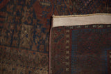 Antique Distressed Belouch rug: worn madder red, coffee brown, sapphire blue pile, and restored side cord.