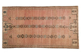 Vintage hand-knotted Belouch rug, distressed dusty rose abrashed field, triple floral gul motifs. 3'8