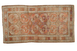 Vintage Distressed Belouch runner rug with blush, brown, and wine red Bokhara guls.
