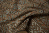 Distressed Belouch runner detail; ivory wave border and blue geometric plant motifs.