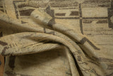 Textured pile of the vintage distressed Oushak rug showing abrashed ivory and charcoal tones.