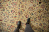 Mostly even wear showing the low pile and knot heads of a vintage Tabriz carpet.