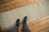 Distressed pile surface of vintage Oushak runner with tone-on-tone abrashes.