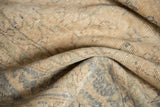 Distressed Oushak pile texture, showing faded ivory, pale blue, and silver floral vinery.