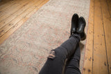 Textured vintage distressed Sparta runner with muted rose and silver Herati pattern.