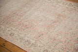 Distressed Sparta runner texture, showing pale rose and oxidized silver Herati motifs.