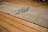 Reverse of vintage Oushak rug runner, showing hand-knotted foundation and neutral beige with painted numbers.