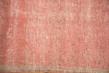 Faded raspberry Oushak runner texture, highlighting distressed wear and faint foundation.