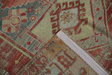 Distressed Caucasian carpet corner, showing geometric pile, foundation, and secured selvage.