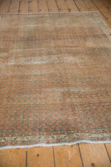Textured pile of a distressed vintage Serbend rug with faded Mir boteh design.