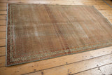 Vintage distressed Serbend rug with overall Mir boteh pattern and rich patina.