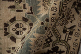 Low-pile texture and even wear of a distressed Malayer rug with Herati-inspired motifs.