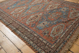 Geometric guls, zig-zag and wave borders on a distressed Soumac flatweave.