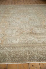 Distressed Sivas carpet detail showing geometric patterns, finned bird motifs in beige and silver.
