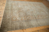 Traditional Turkish Sivas carpet corner, displaying time-softened beige geometric and floral motifs.