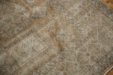 Time-softened antique ivory and beige floral motifs on a distressed vintage Sivas carpet.