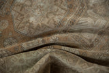 Distressed Sivas carpet pile showing even wear in coffee brown and antique ivory hues.