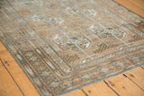 Distressed vintage Belouch runner showing geometric border, muted gul motifs, and secured selvage.
